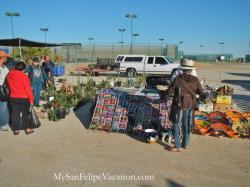 Decorative plats on display for sale at Cachanilla swap meet