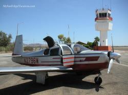 Plane taxing on tarmac at San Felipe International Airport